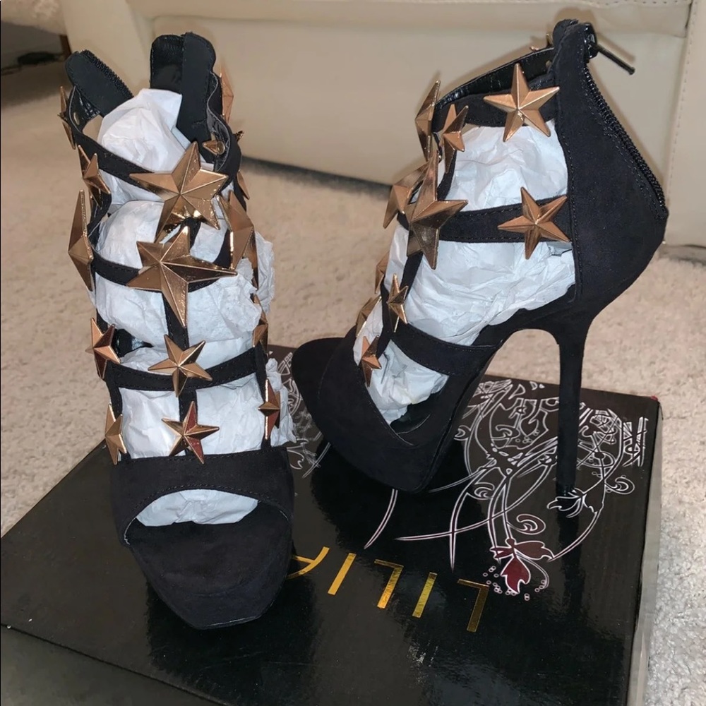 Black sandals with gold stars